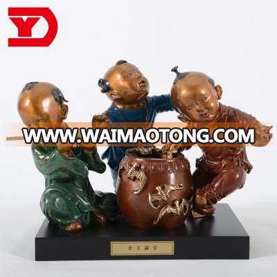 Ancient Chinese bronze sculptures of children playing